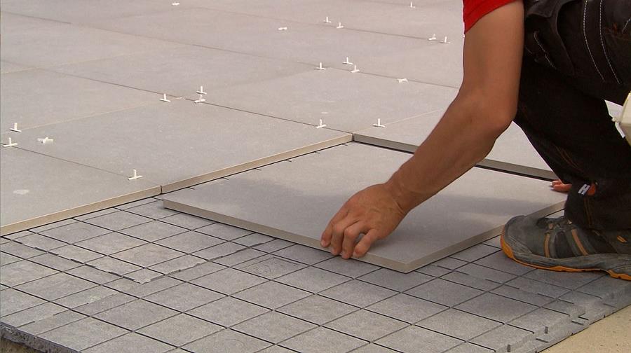 Zo leg je een terras met stabilisatiematten